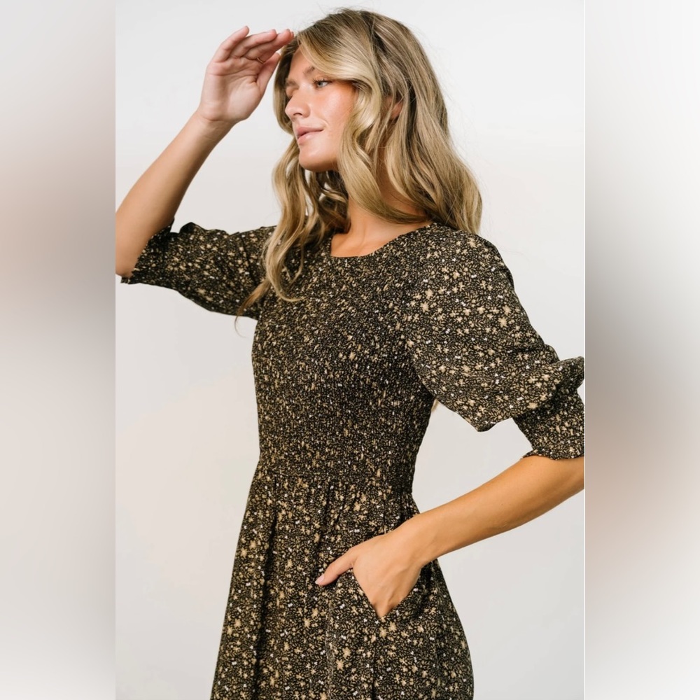 Baltic Born pele tiered midi dress. Size small in black floral. NWT